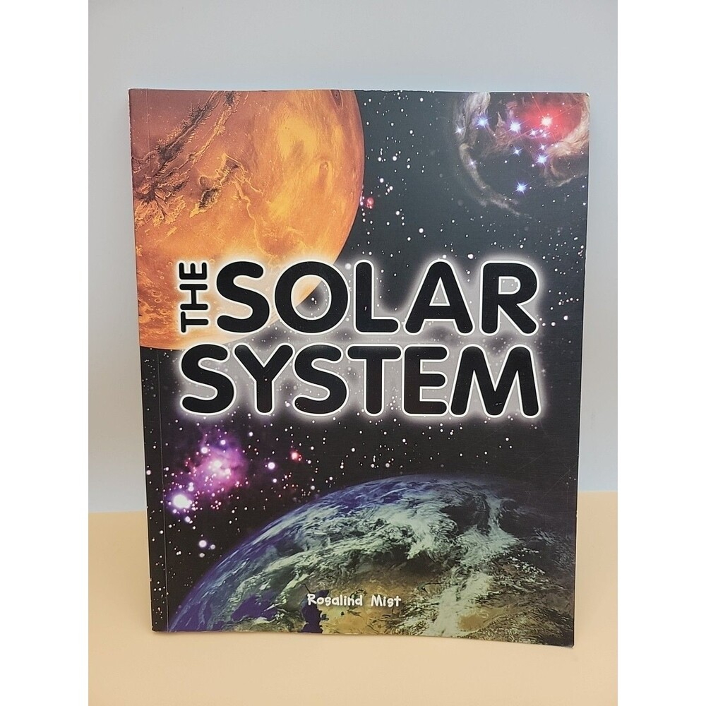 The Solar System - Paperback - VERY GOOD